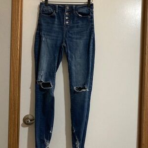 High-Rise Dark Blue Distressed Skinny Jeans with Button Fly